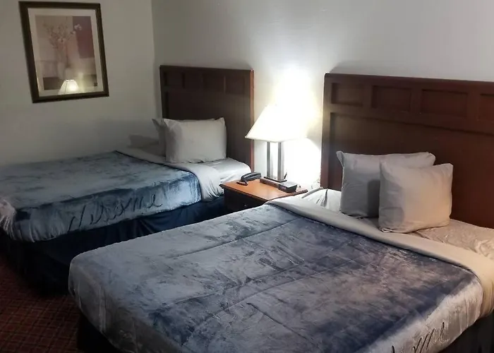 Hotel 2 Queen Beds Hotel Room 222 Wi-Fi Hot Tub Booking